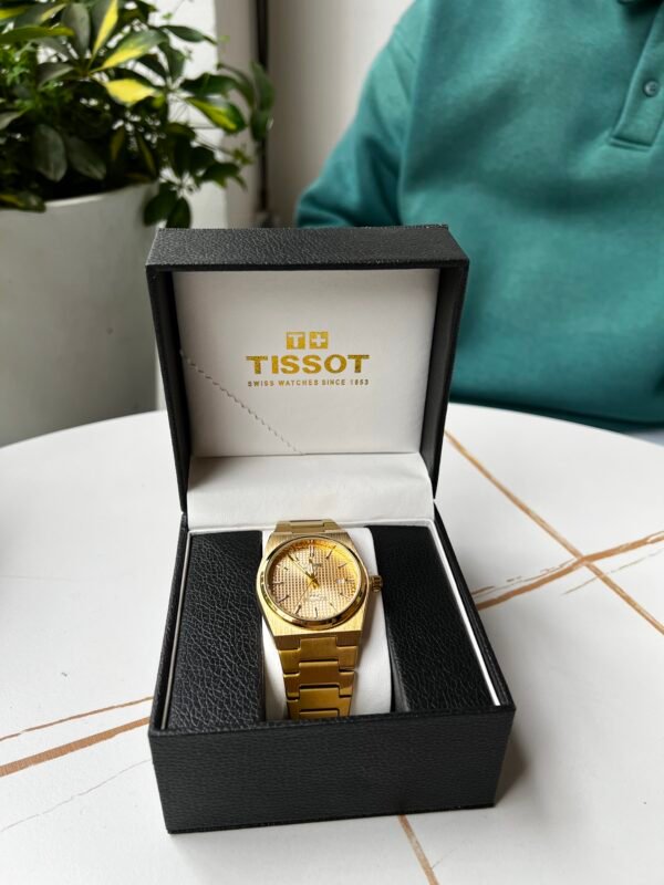 Montre Tissot Gold